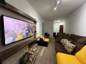 Aconchego no Canto do Forte - Ar Condicionados - Tvs Grandes - Wi-fi e Estacionamento Incluso